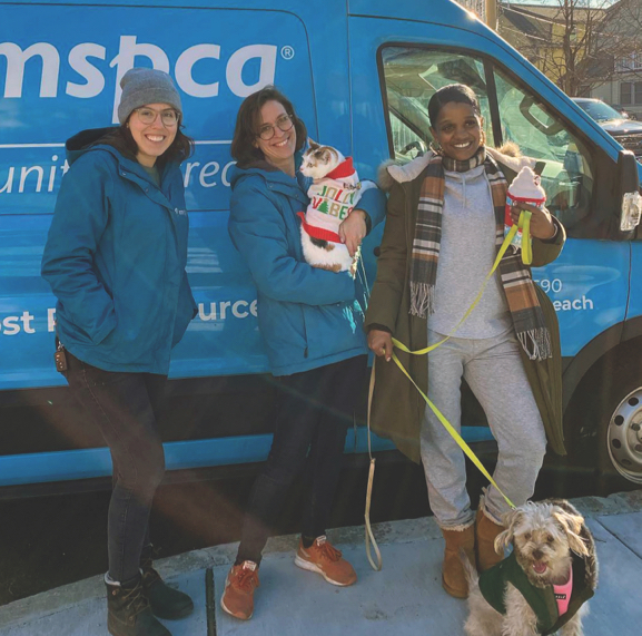 Brianna Leon, MSPCA-Angell Community Outreach Manager; Alyssa Krieger, MSPCA-Angell Associate Director of Community Outreach; and Fallyn Graham, with her dog Cocoa and cat Chyna